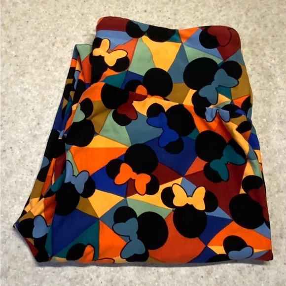 LuLaRoe Pants - LuLaRoe Multicolor Disney Patterned Fabric